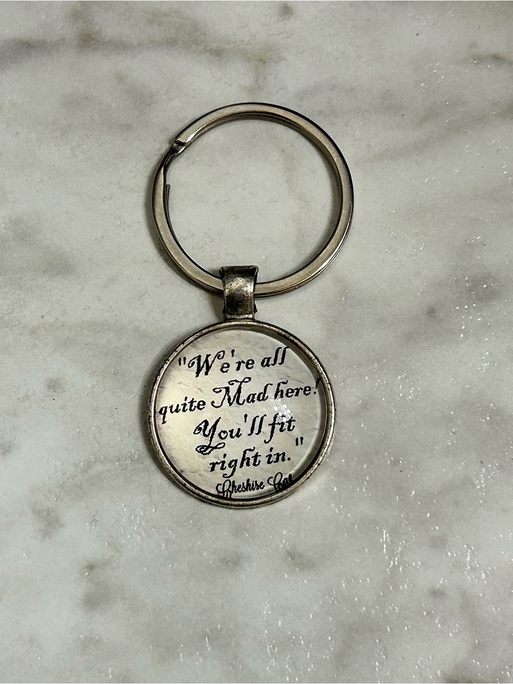 Cheshire Cat Quote Round Keychain - Silver Tone
